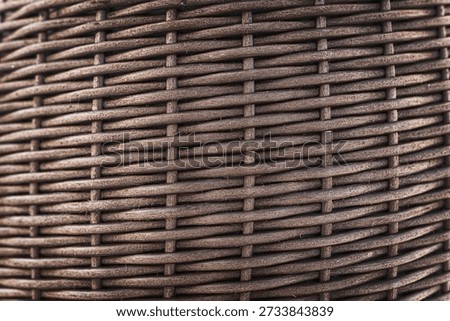 Wicker basket texture, geometric pattern.