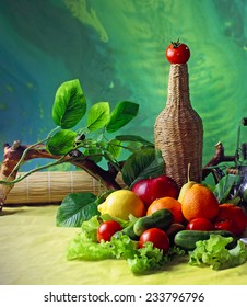 Wicker bottle and fruit.