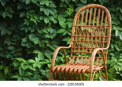 Wicker Chair In A Garden