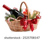 Wicker gift basket with wine and Christmas decor isolated on white