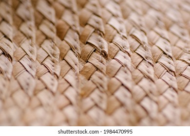 Wicker Straw Hat Close-up. Macro View. Organic Fiber Material. Natural Weaving Texture. Beige Headband. Vacation Summer Anticipation. Autumn Mood. Craft Handicraft.  Banner Copy Space Broun