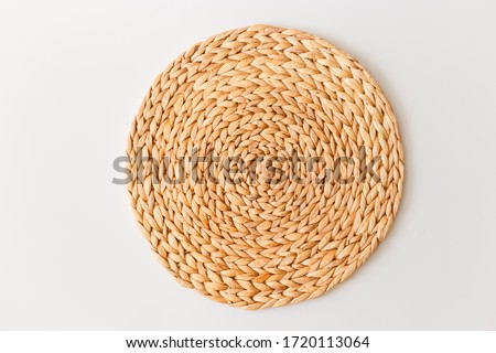 Wicker straw stand isolated on white background. Flat lay, top view minimal social media template