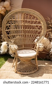 Wicker vintage chair on brown background - Shutterstock ID 2248161771