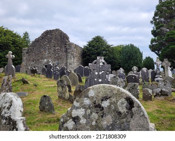 WICKLOW, IRELAND - 22nd of August 2021: Monastic cemetery of Glendalough, Ireland. Monastery in the wicklow mountains.