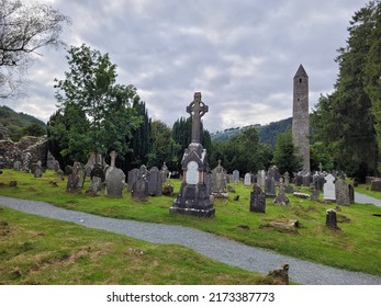 WICKLOW, IRELAND - 22nd of August 2021: Monastic cemetery of Glendalough, Ireland. Monastery in the wicklow mountains.