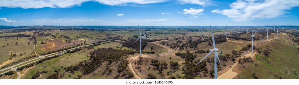 Wide Aerial Panorama Of Hume Highway And Wind Farm In Beautiful Australian Countryside. Breadalbane, NSW, Australia