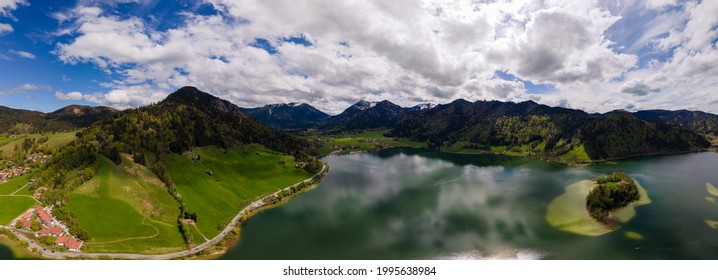 A wide aerial Panorama of laA wide aerial Panorama of lake Schliersee and surrounding mountains in Bavaria. High quality photoke Schliersee and surrounding mountains in bavaria. High quality photo. 