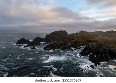 Wide aerial photograph of the rugged coast at Malin Head with dramatic clouds, Donegal - Powered by Shutterstock