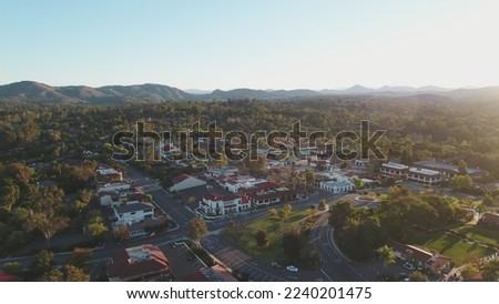 Wide aerial of town of Rancho Sante Fe in southern California at sunrise