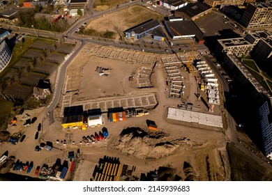 Wide aerial view of real estate project PUUR21 new housing construction site part of urban development plan Noorderhaven neighbourhood with blueprint outline visible on initial building phase - Shutterstock ID 2145939683