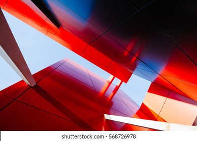 Wide angle abstract background view of steel light blue high rise commercial building skyscraper made of glass exterior. concept of successful industrial architecture and office center building - Shutterstock ID 568726978