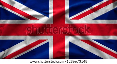 Wide angle banner of the British Union Jack flag or Union Flag in a textured full frame background view