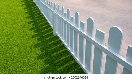 Wide angle and diagonal view of white wooden picket with green artificial turf in front yard area