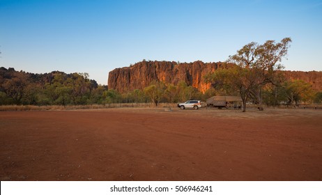 Wide Angle Image Of Of Four Wheel Drive Vehicle And Off Road Camper Trailer