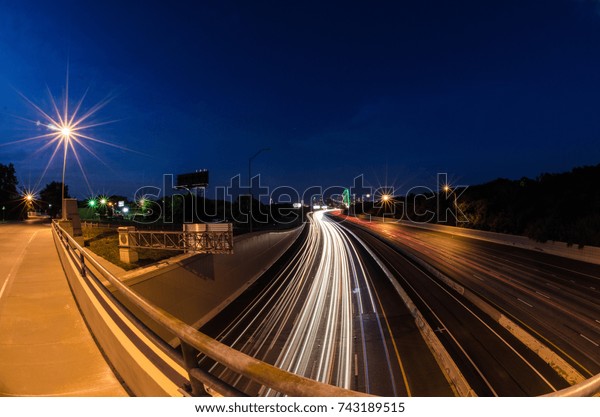 Wide Angle Light Trails leading to downtown Dallas,\
Texas. Eastbound I-30