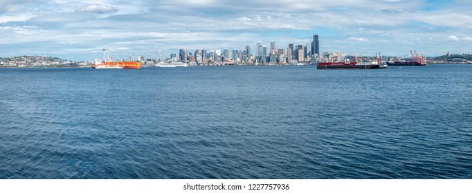 Wide Angle and Low Angle of the City of Seattle with Cargo Boats in the Foreground - Shutterstock ID 1227757936