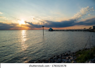 Wide Angle Photo Of A Crabbing Station On A Boardwalk Jutting Over Currituck Sound In Duck, NC.