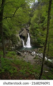 Wide angle shot of the Bash Bish Falls with trees surrounding it