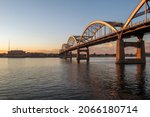 A Wide Angle Shot of Beautiful Sunrise Light on the Centennial Bridge Spanning the Mighty Mississippi River Connecting Davenport, Iowa to Rock Island, Illinois