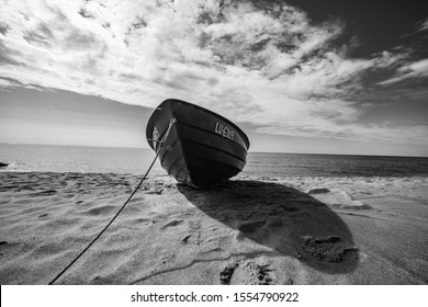 Wide angle shot of the boat. Wooden boat at sea cost