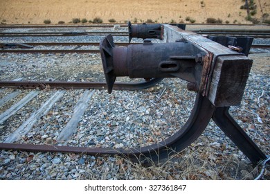 Wide angle view of dead end of a railway, closeup, shallow depth of field