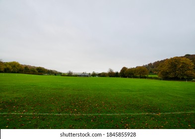 Wide Angle View Of An Empty Cricket Pitch In Autumn 