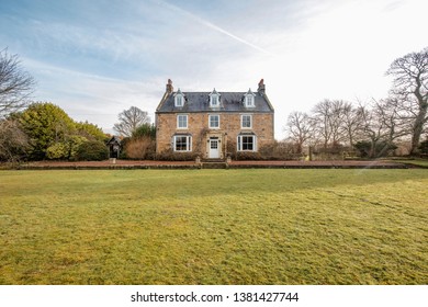 Wide Angle View Of The Exterior Of A Country House In County Durham. 