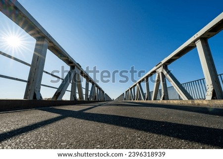 Similar – Image, Stock Photo Frog perspective | View into the bare treetops in the forest.