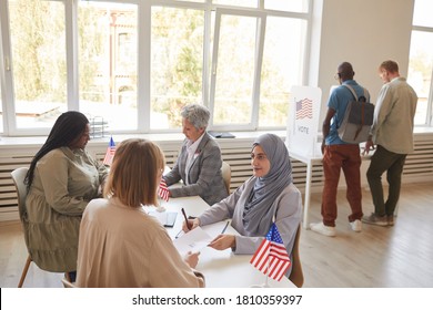 Wide Angle View Of People Voting At Polling Station On Election Day, Copy Space