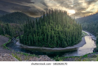 Wide angle view of Saint Joe's river with bend at island at sunset. - Shutterstock ID 1802828170