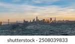 Wide angle view of San Francisco city at sunset time.