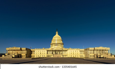 Wide Angle View Of The United States Capitol Building In The Morning With Blue Sky, Washington DC