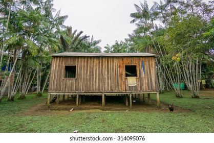 Wide Angle View Of Wooden House Built In Amazon Rainforest, Brazil