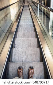 Wide angled view to perspective escalators stairway.
