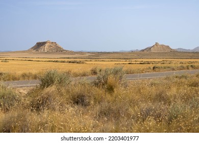 Wide Arid Golden Desert, Off Road, With Extreme Heat And Very Textured, In Bardenas Reales, Navarra, Spain