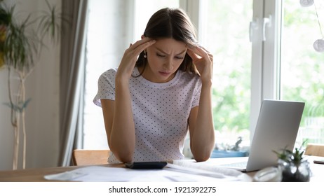 Wide Banner Panoramic View Of Upset Millennial Caucasian Woman Frustrated By Mistake Paying Bills On Laptop Online. Unhappy Young Female Confused Debt Or Bankruptcy Managing Finances At Home.