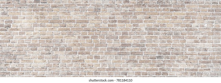 Wide Beige brick wall panoramic background texture. Home and office design backdrop - Shutterstock ID 781184110