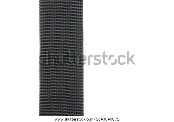 \
Wide black textile belt. Nothing extra. Belt\
made of fabric on a white isolated background. The abstraction is\
interesting. Vertical\
layout.