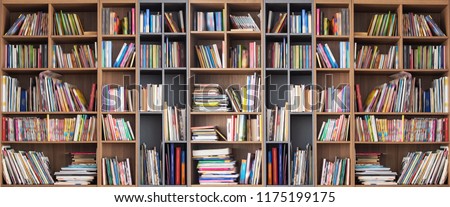 Wide book shelves with blurry effect on book cover