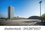 Wide City Plaza in Early Morning Light with Modern Buildings