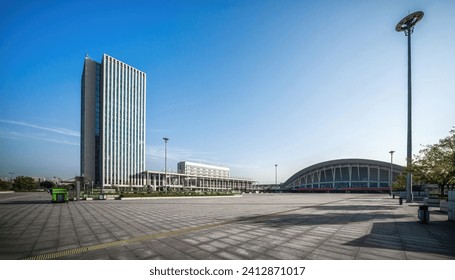 Wide City Plaza in Early Morning Light with Modern Buildings