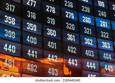 Wide Curved Futuristic Multiple Panel Video Presentation Wall With Sequence Of Numbers On Many Screens. Streaming Media, Cyberspace, Internet Concept.Soft Focus Photo.