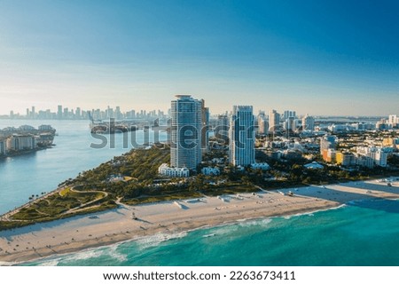 wide drone shot of the port of miami florida during a bright sunny day. Miami Beach, wonderful aerial view of buildings, river and vegetation. Panorama view of Miami Beach, South Beach, Florida, USA.