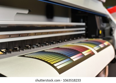Wide format printer in work. Printing test image