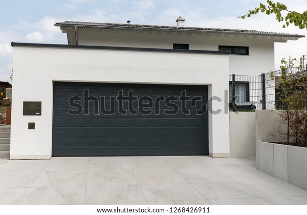 Wide Garage Door On White Dwelling Stock Photo Edit Now 1268426911