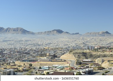 Wide High Angle View Of El Paso, Texas, USA/Juárez, Mexico And Juarez Mountains Against Clear Blue Day 