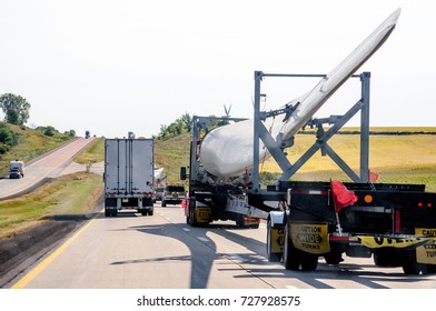 Wide Load Semi Truck Carries A  Wind Mill Blade For Delivery At A Wind Mill  Farm