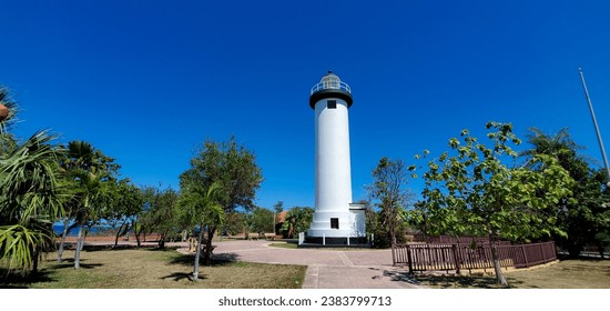 wide low angle view of Punta Higuera lighthouse in Rincon Puerto Rico