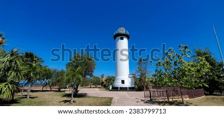 wide low angle view of Punta Higuera lighthouse in Rincon Puerto Rico