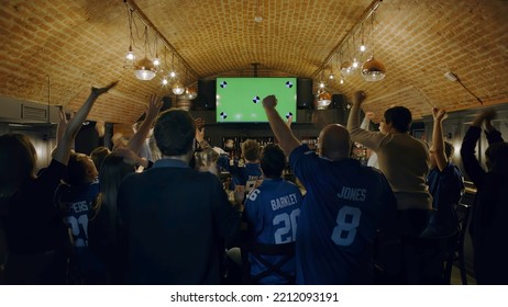 WIDE Model released, fans watching a game on a large TV in a sport pub, celebrating a goal, green screen chroma key